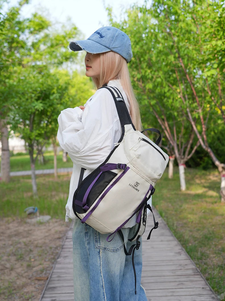 Outdoor cycling hydration backpack with survival whistle and reflective strips - product image