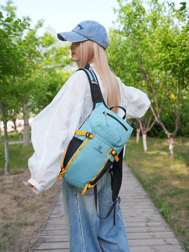 Outdoor cycling hydration backpack with survival whistle and reflective strips - product image