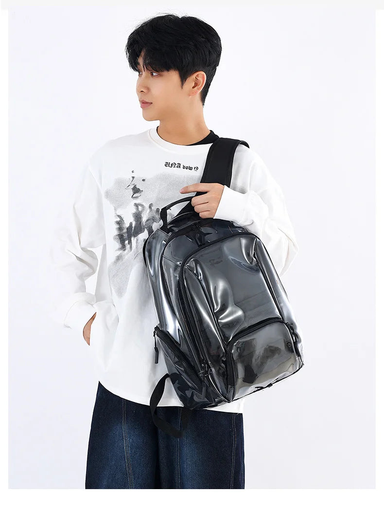Transparent pvc backpack with multi-compartment storage and trolley sleeve - product image