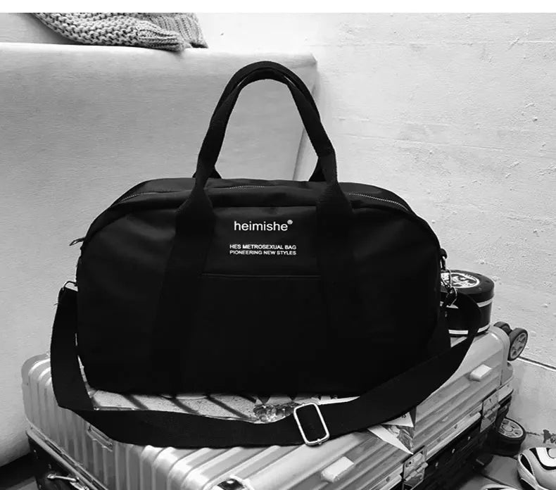 Waterproof nylon gym bag with sturdy handles and detachable shoulder strap - product image