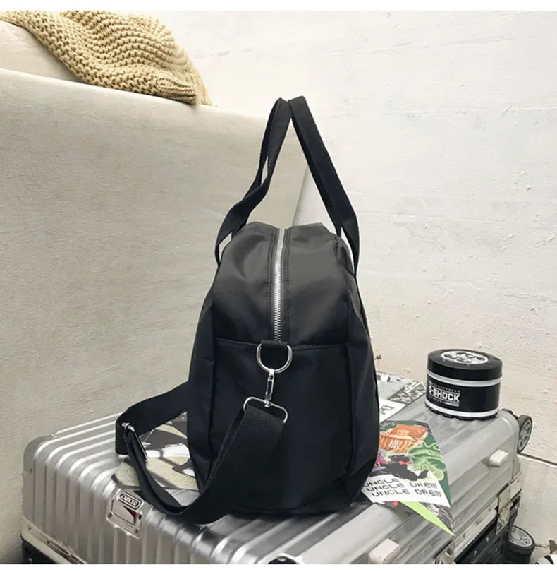 Waterproof nylon gym bag with sturdy handles and detachable shoulder strap - product image