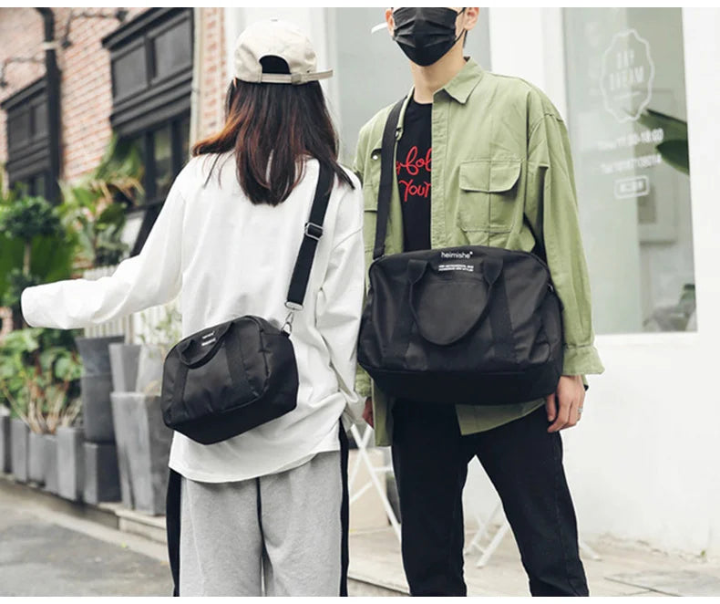 Waterproof nylon gym bag with sturdy handles and detachable shoulder strap - product image