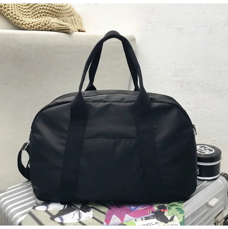 Waterproof nylon gym bag with sturdy handles and detachable shoulder strap - product image