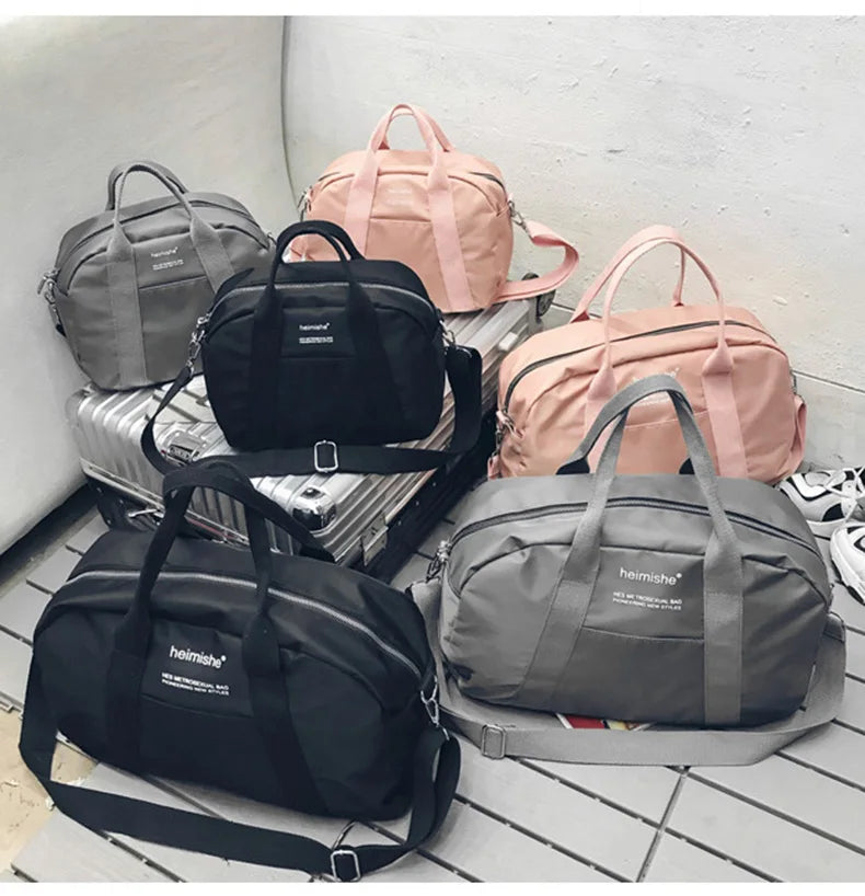 Waterproof nylon gym bag with sturdy handles and detachable shoulder strap - product image