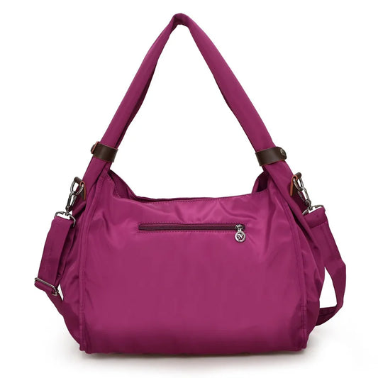Waterproof nylon mummy gym bag for women with multiple carry options - product image