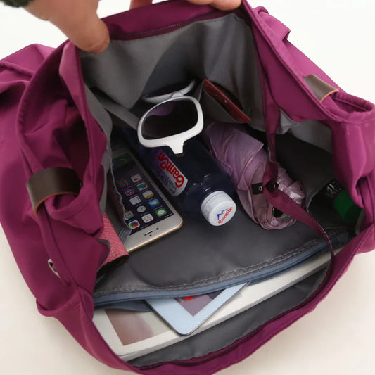 Waterproof nylon mummy gym bag for women with multiple carry options - product image