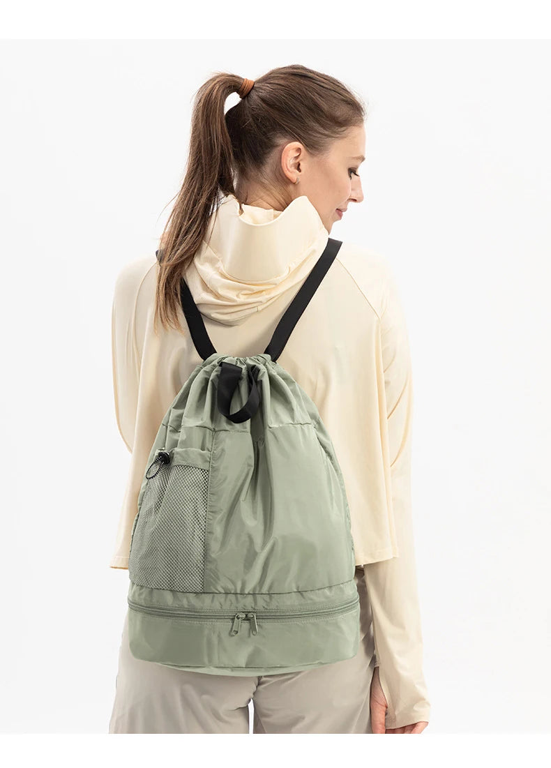 Polyester mesh drawstring backpack with wet dry separation and shoe compartment - product image